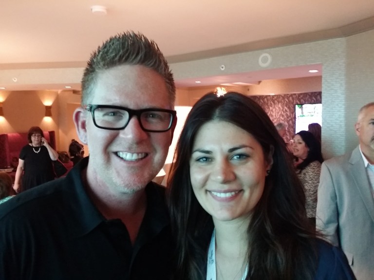 Maria Langgle with Tom Ferry at a coaching event